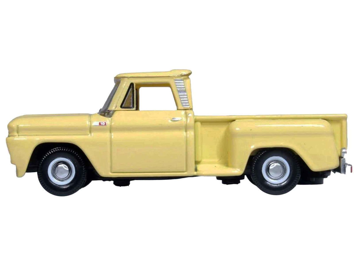 Yellow 1965 Chevrolet C10 Stepside Pickup Truck diecast model by Oxford Diecast, 1/87 scale, detailed miniature collectible.