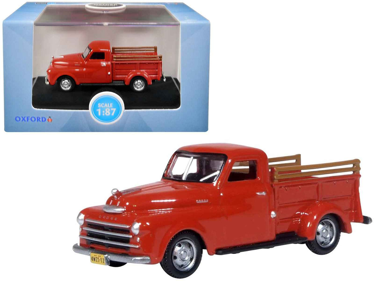 Red 1948 Dodge B-1B Pickup Truck diecast model in 1/87 scale by Oxford Diecast, detailed miniature collectible for enthusiasts.