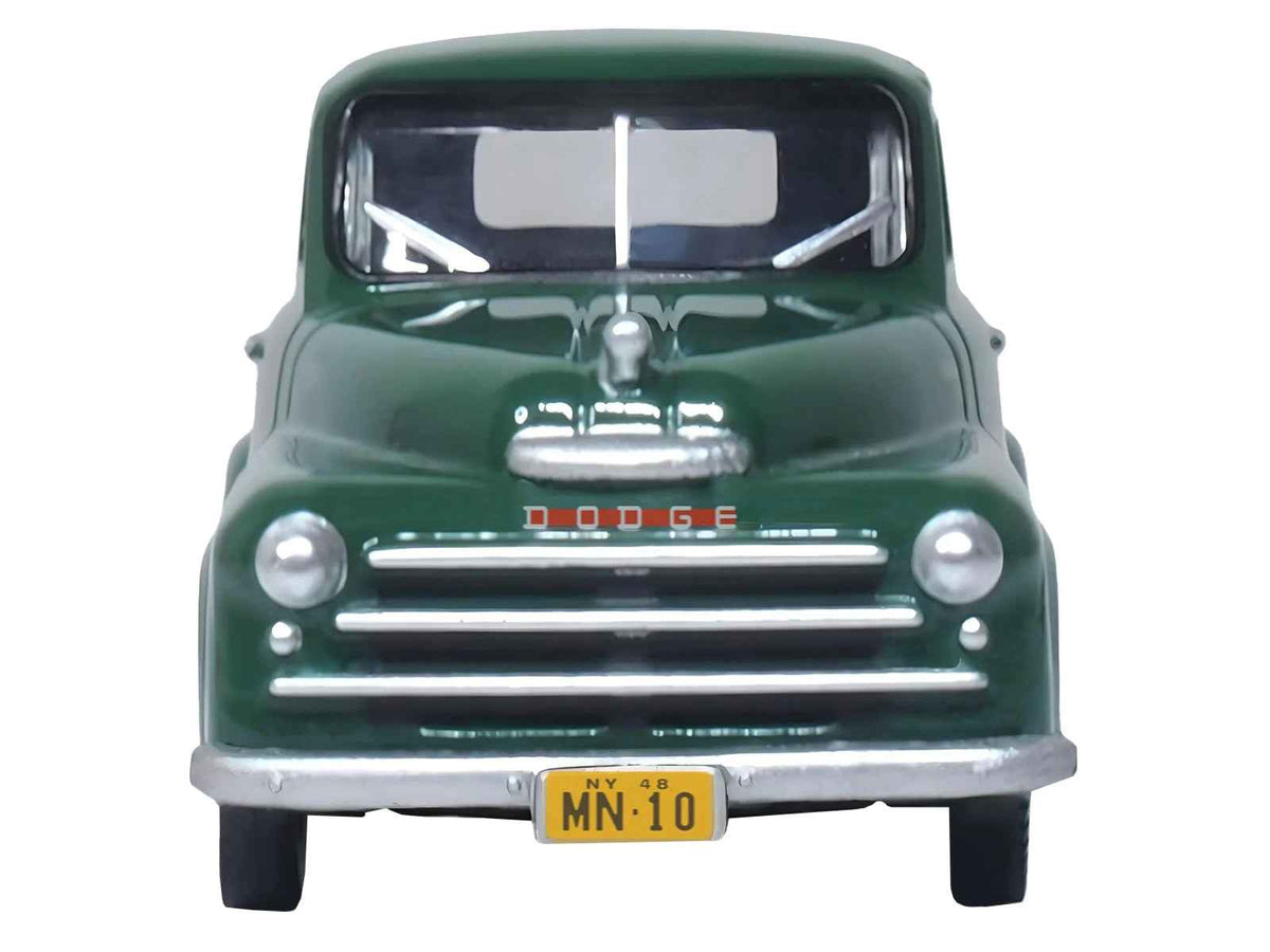 Green 1948 Dodge B-1B pickup truck diecast model by Oxford Diecast, showcasing Railway Express Agency details in 1/87 scale.