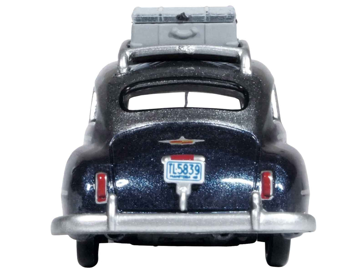Miniature Motors 1946 DeSoto Suburban diecast model car with roof rack and luggage, butterfly blue metallic with crystal gray top, 1/87 scale