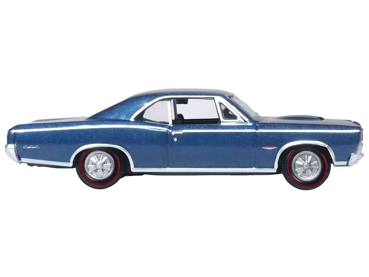 Miniature Pontiac GTO diecast model in Fontaine Blue Metallic, 1/87 scale by Oxford Diecast, detailed collectible car.