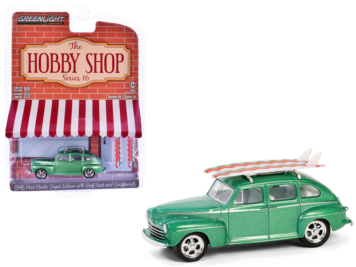 Miniature Motors 1/64 diecast model of 1946 Ford Fordor Super Deluxe in green metallic with white interior and surfboards on roof rack