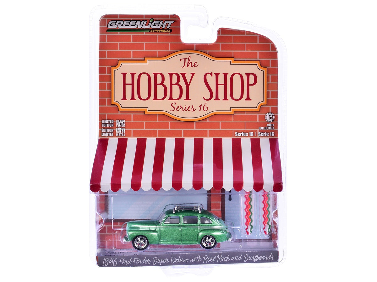 Miniature Motors 1/64 diecast model of 1946 Ford Fordor Super Deluxe in green metallic with white interior and roof rack with surfboards.