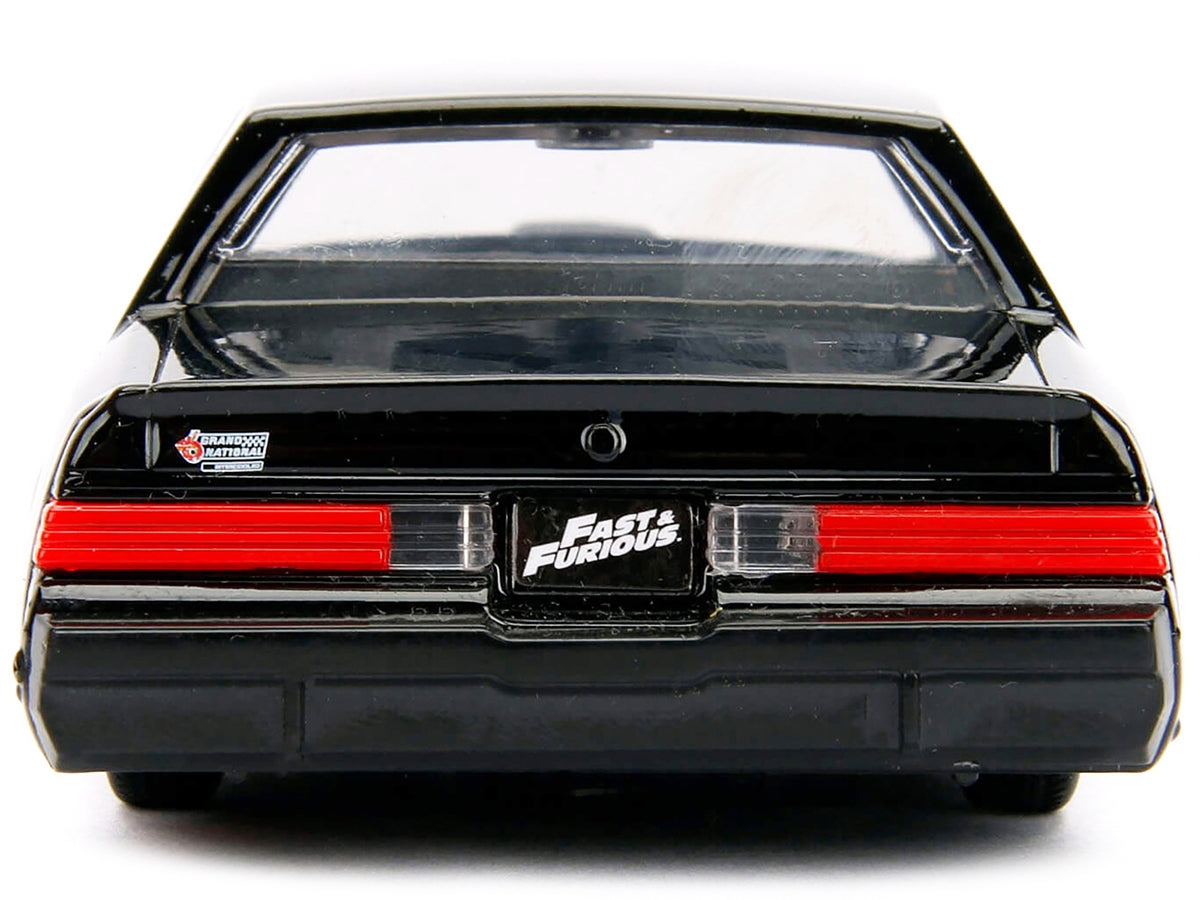 Miniature Motors Jada 1/32 diecast model of Dom's Buick Grand National from Fast & Furious movie in black, detailed TV series collectible car