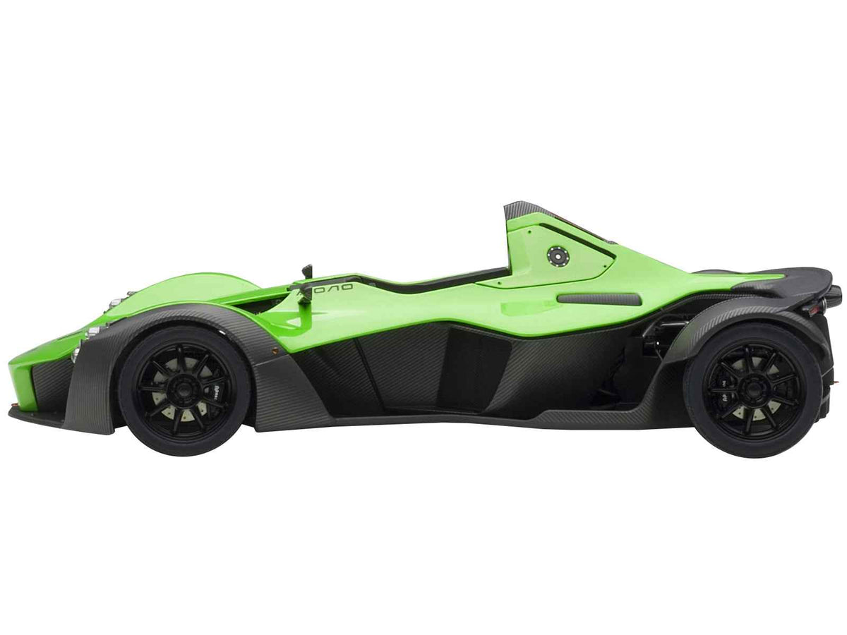 Miniature Motors BAC Mono metallic green 1/18 scale model car by Autoart, detailed with realistic features and sleek design.