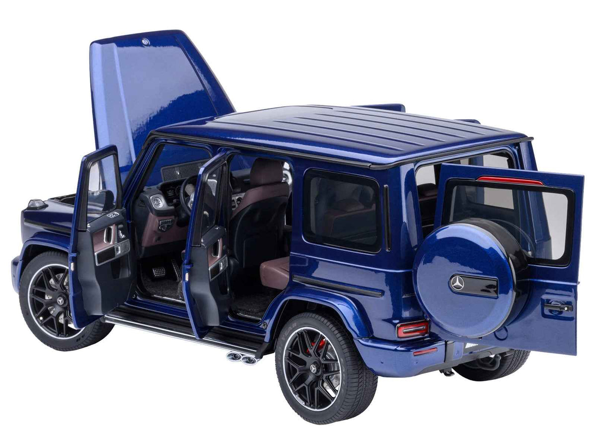 Miniature Mercedes-Benz AMG G63 model car in Brilliant Blue Metallic by Autoart, detailed 1/18 scale Mercedes-Benz collectible.