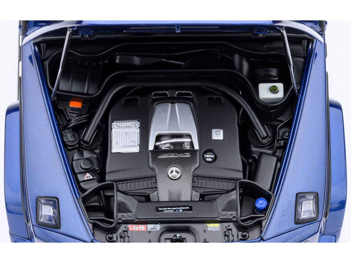Detailed 1/18 scale Mercedes-Benz AMG G63 model car in Brilliant Blue Metallic by Autoart, showcasing realistic design and features.