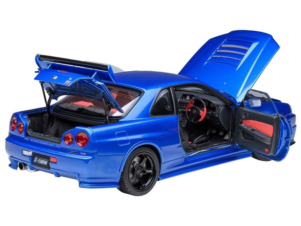 Miniature Motors Nissan Skyline GT-R R34 Nismo Z-TUNE model car in Bayside Blue, right-hand drive, 1/18 scale by Autoart.