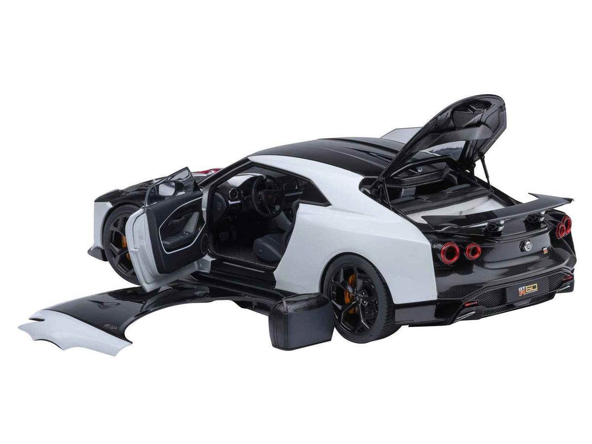 Miniature Motors Nissan GT-R50 by ItalDesign 1/18 scale model car in black and white metallic finish, detailed collectible Nissan model