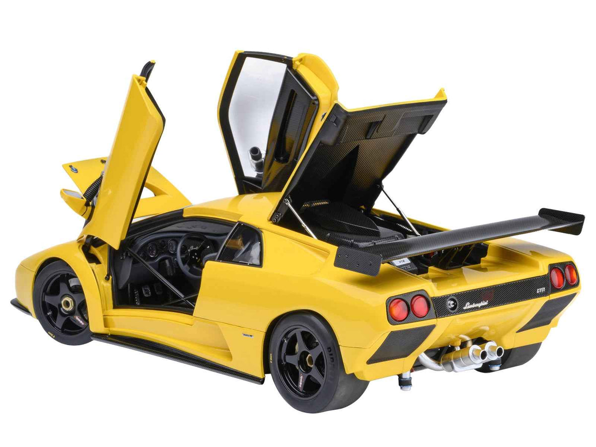 Miniature Motors Lamborghini Diablo GTR Superfly yellow 1/18 scale model car by Autoart, detailed view of the collectible Lamborghini model.