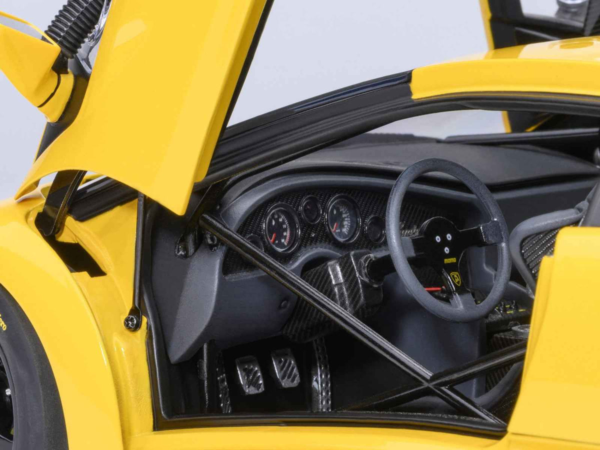 Yellow Lamborghini Diablo GTR Superfly 1/18 scale model car by Autoart, detailed miniature Lamborghini model in a vibrant yellow finish.