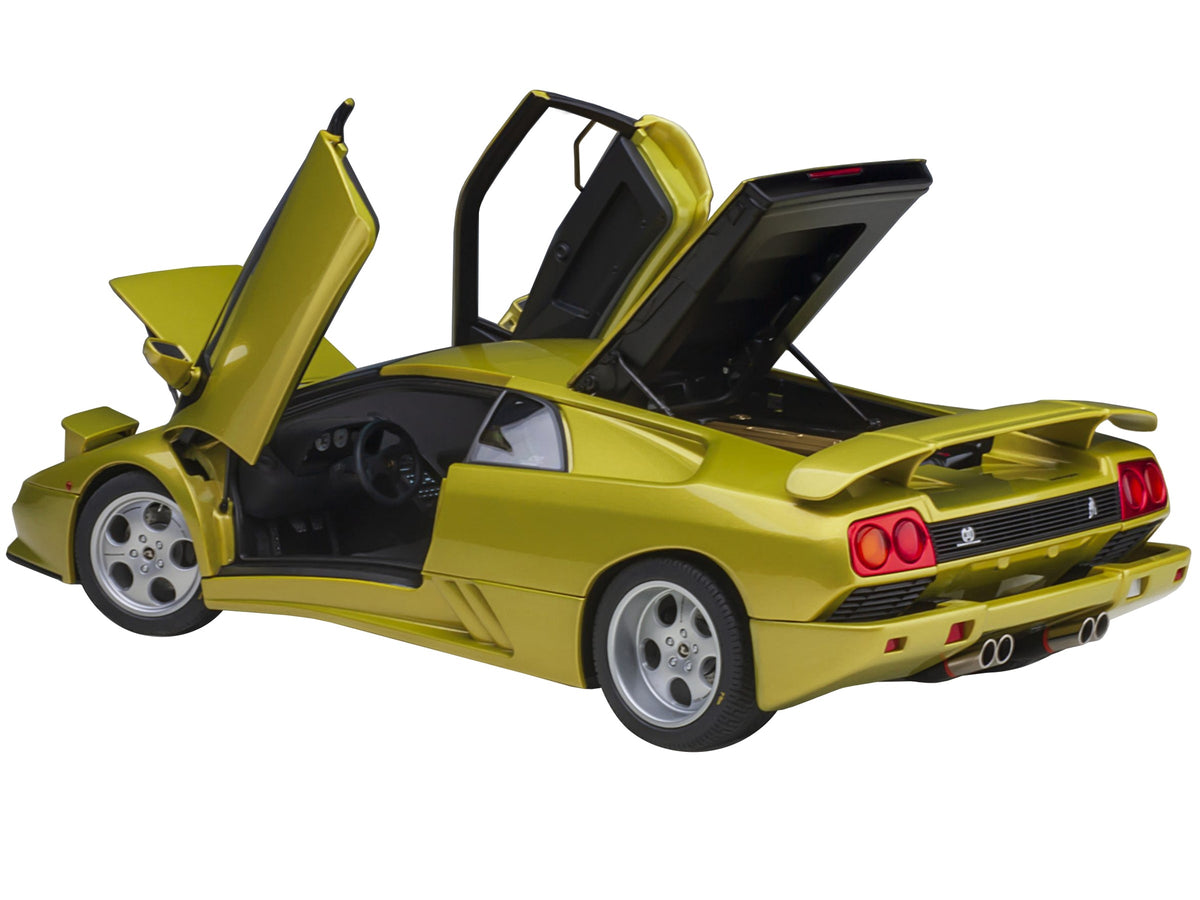 Yellow metallic Lamborghini Diablo SE30 Spyder 1/18 scale model car by Autoart, detailed miniature Lamborghini model for collectors.