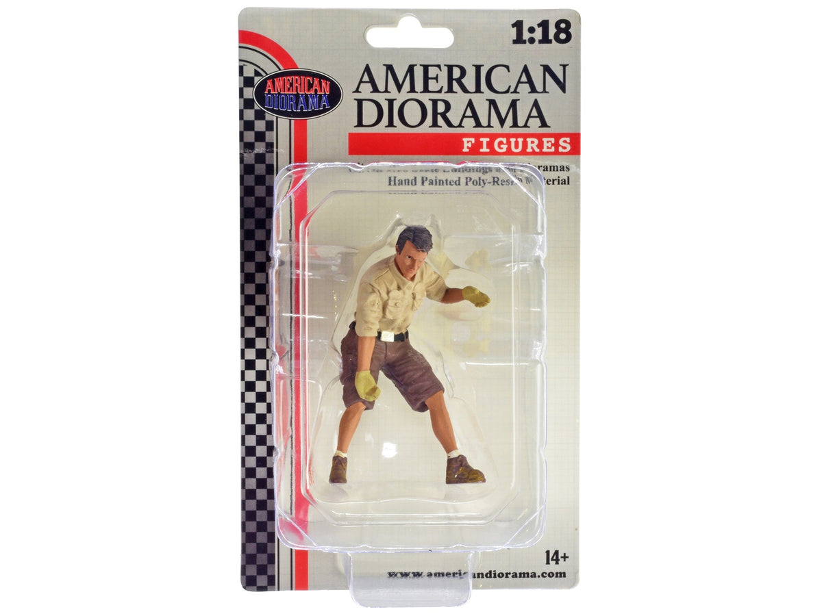 Miniature 4x4 mechanic figure with board accessory for 1/18 scale models by Miniature Motors, detailed figure for model displays.