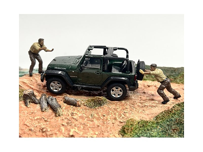 Two 1/43 scale diecast mechanic figures by Miniature Motors from the 4X4 Mechanics set, detailed miniature model figures.