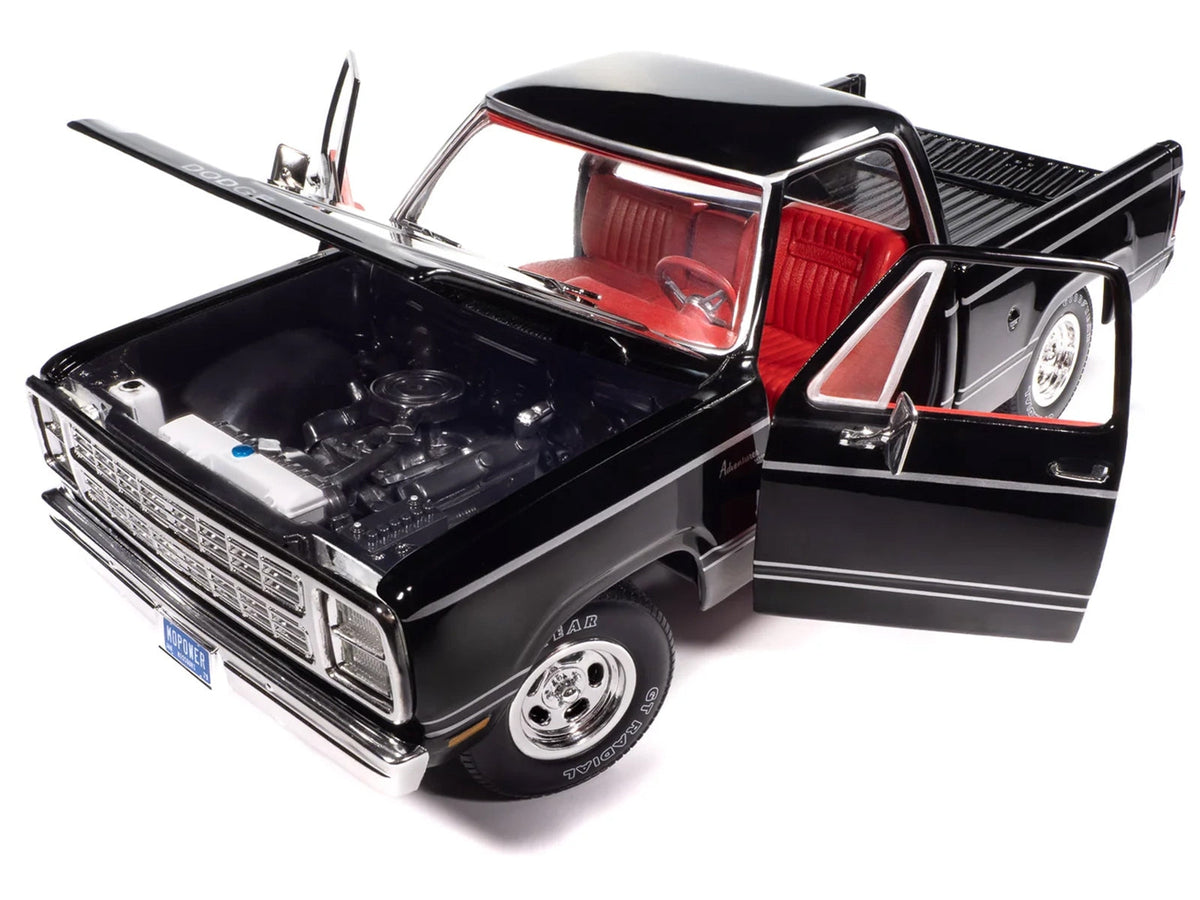 Black 1979 Dodge Adventurer Sweptline pickup truck diecast model by Auto World, featuring red interior, part of American Muscle Series.