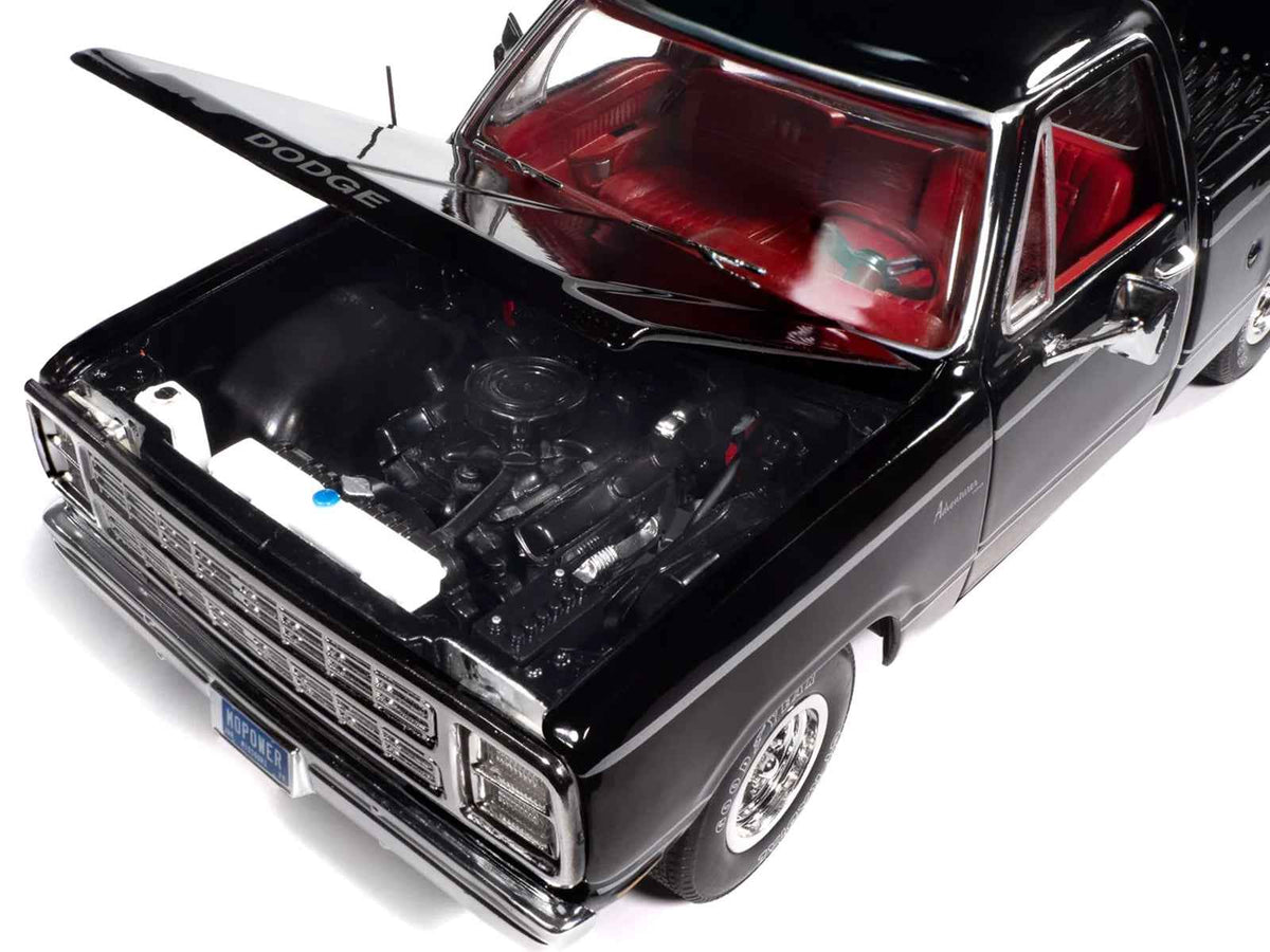 1979 Dodge Adventurer Sweptline pickup truck diecast model in black with red interior, part of Miniature Motors American Muscle series.