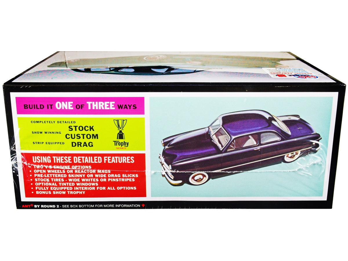 Miniature Motors 1/25 scale Skill 2 Model Kit of 1949 Ford Coupe "The 49'er" 3-in-1 model kit with assembled car and parts.