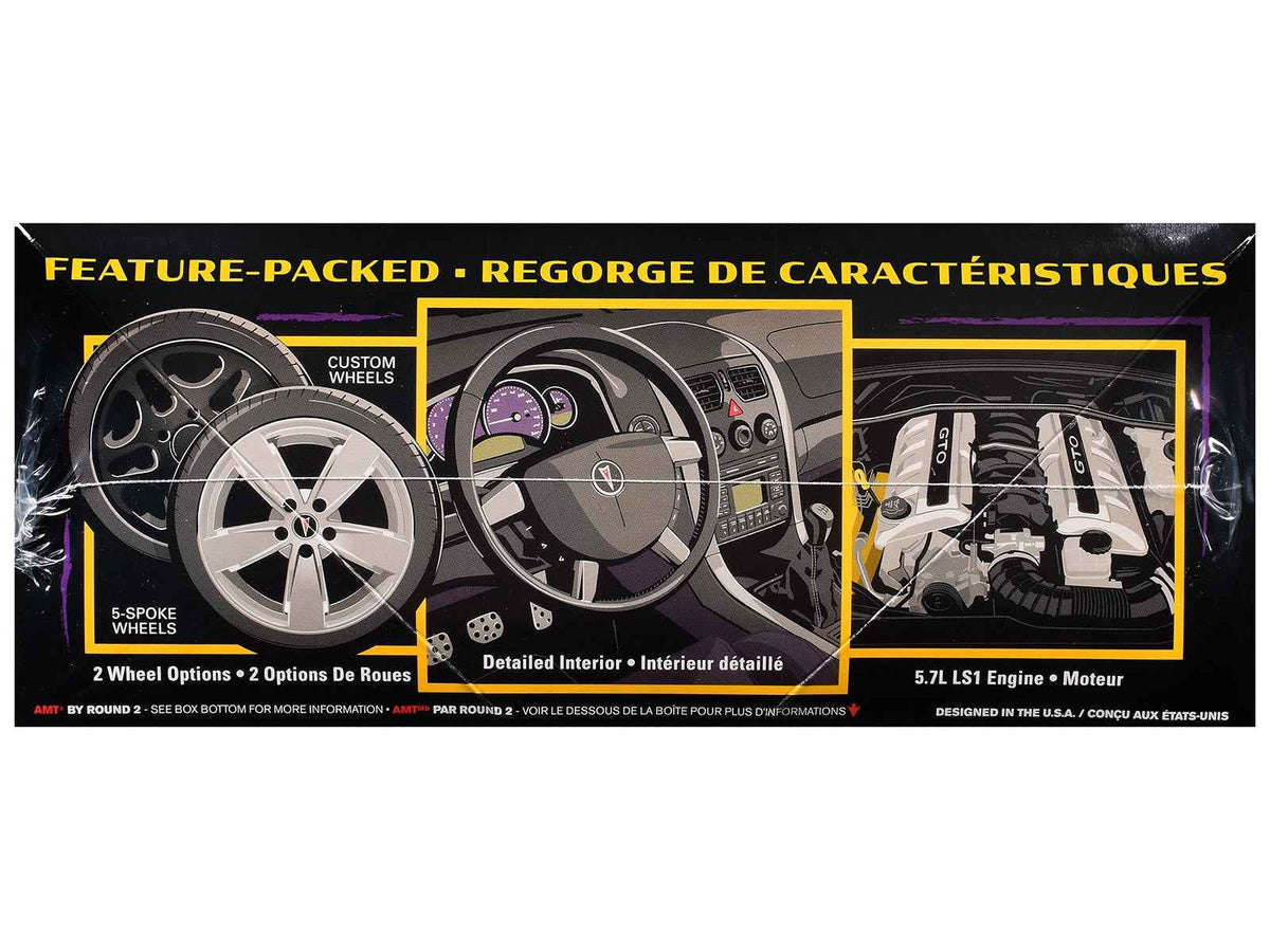 Detailed 1/25 scale Pontiac GTO model kit by AMT from Miniature Motors, showcasing the assembled 2004 Pontiac GTO car.