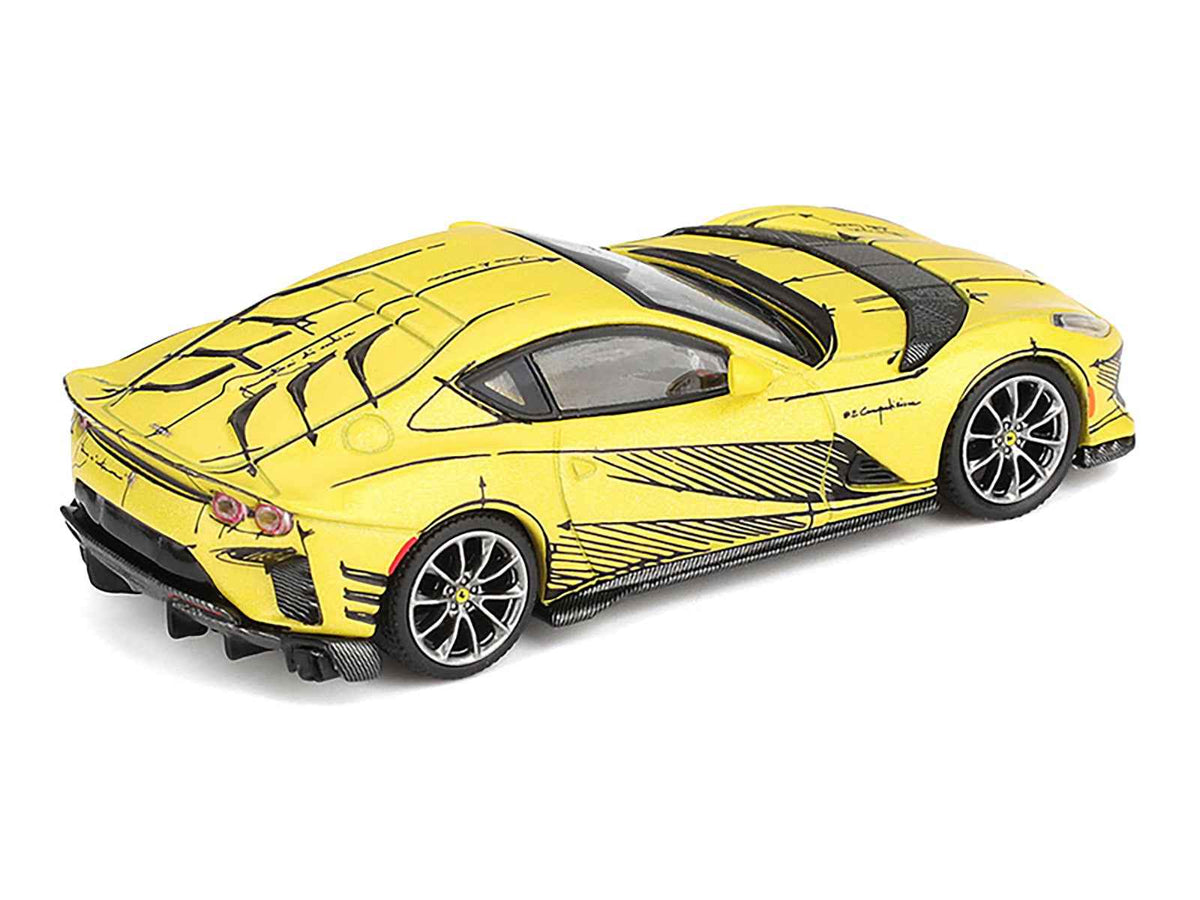Miniature Ferrari 812 Competizione diecast model car in matte yellow with graphics and yellow interior by BBR, 1/64 scale.