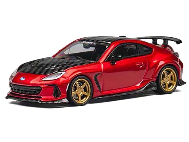 Red metallic Subaru BRZ Varis Arising-1 RHD diecast model car by Miniature Motors, featuring carbon hood and extra wheels.