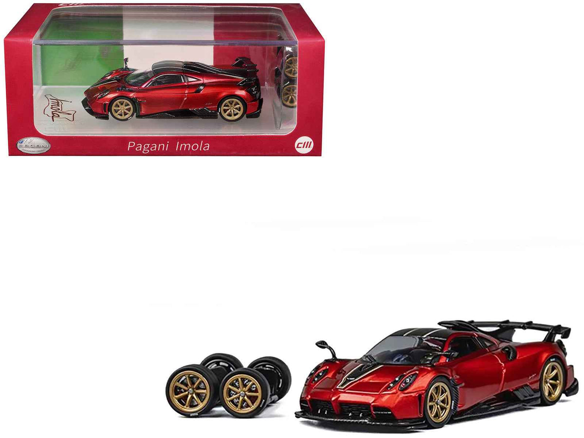 Red metallic Pagani Imola 1/64 diecast model car with carbon top, stripes, and extra wheels by Miniature Motors.