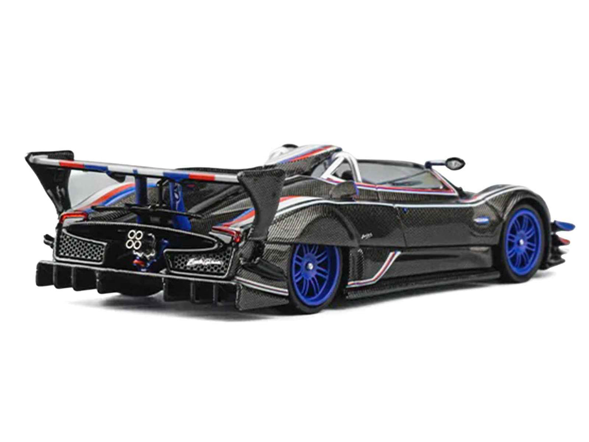 Miniature Motors Pagani Zonda Revo Barchetta 1/64 diecast model car with red, white, and blue stripes, detailed carbon finish.