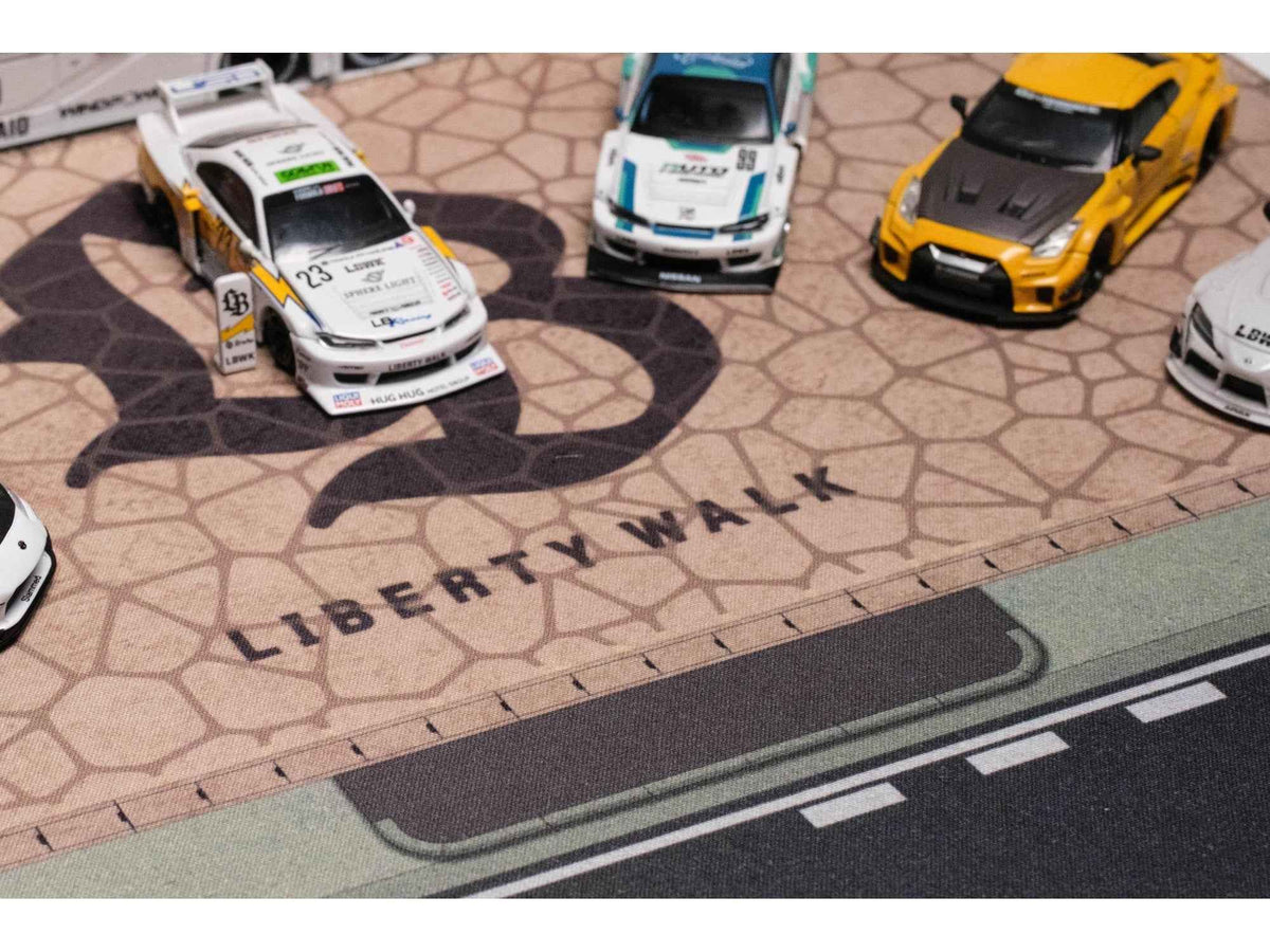 Miniature Motors Desktop display mat with "LB" logo, decorative accessory for car enthusiasts by Dream Customs.