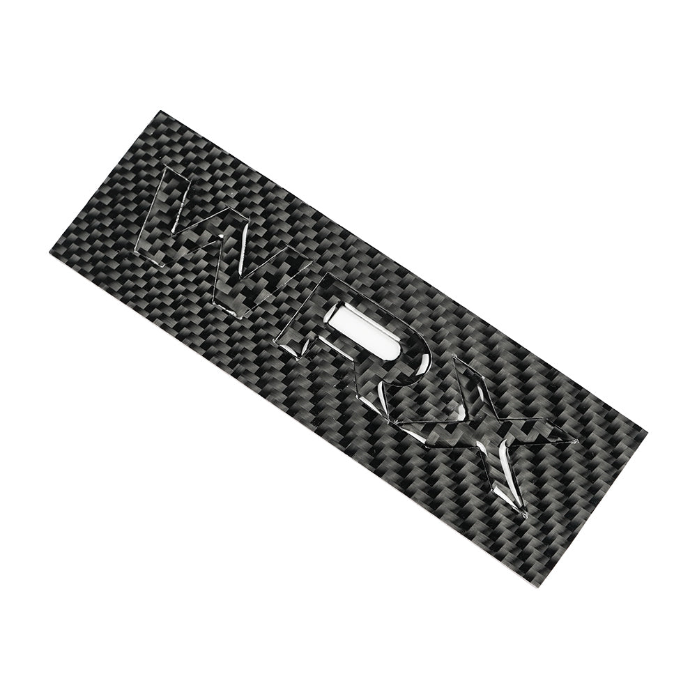 Racing Art Carbon Fiber WRX trunk emblem by JDMuscle, automotive ornament for Subaru WRX 2022-2025, close-up view.