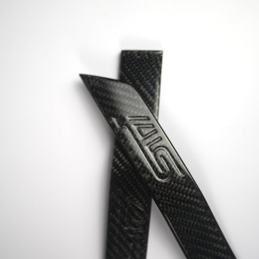 JDMuscle carbon fiber fender emblem with STI etching for 2015-2021 Subaru WRX and STI, showcasing detailed emblem design.