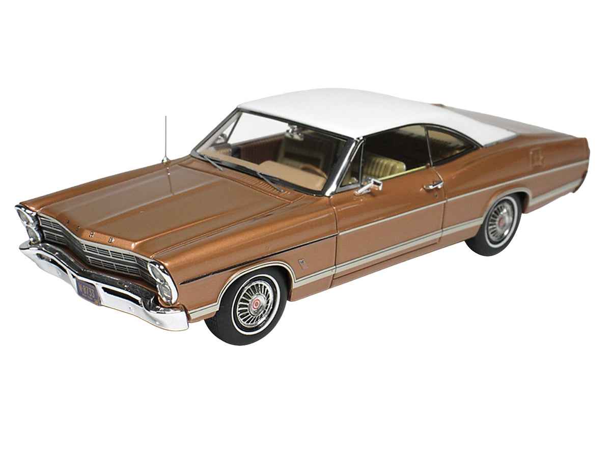 Miniature 1/43 scale Ford Galaxie model car in Burnt Amber Metallic with white top by Goldvarg Collection, limited edition collectible.