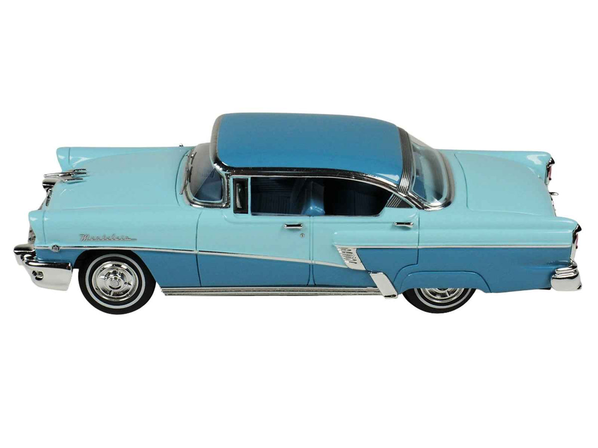 Miniature 1956 Mercury Montclair Phaeton model car in Lauderdale Blue and Niagara Blue by Goldvarg Collection, limited edition 1/43 scale.