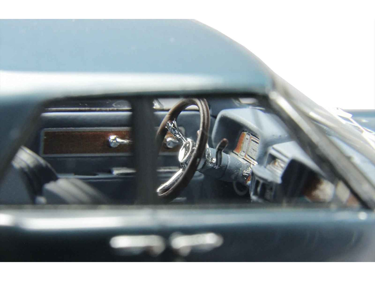 Miniature 1/43 Lincoln Continental model by Goldvarg Collection in Oxford Gray Metallic with blue interior, limited edition collectible.