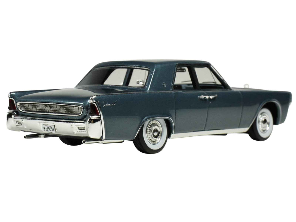 Miniature 1962 Lincoln Continental model car by Goldvarg Collection, Oxford Gray Metallic with blue interior, limited edition 1/43 scale.