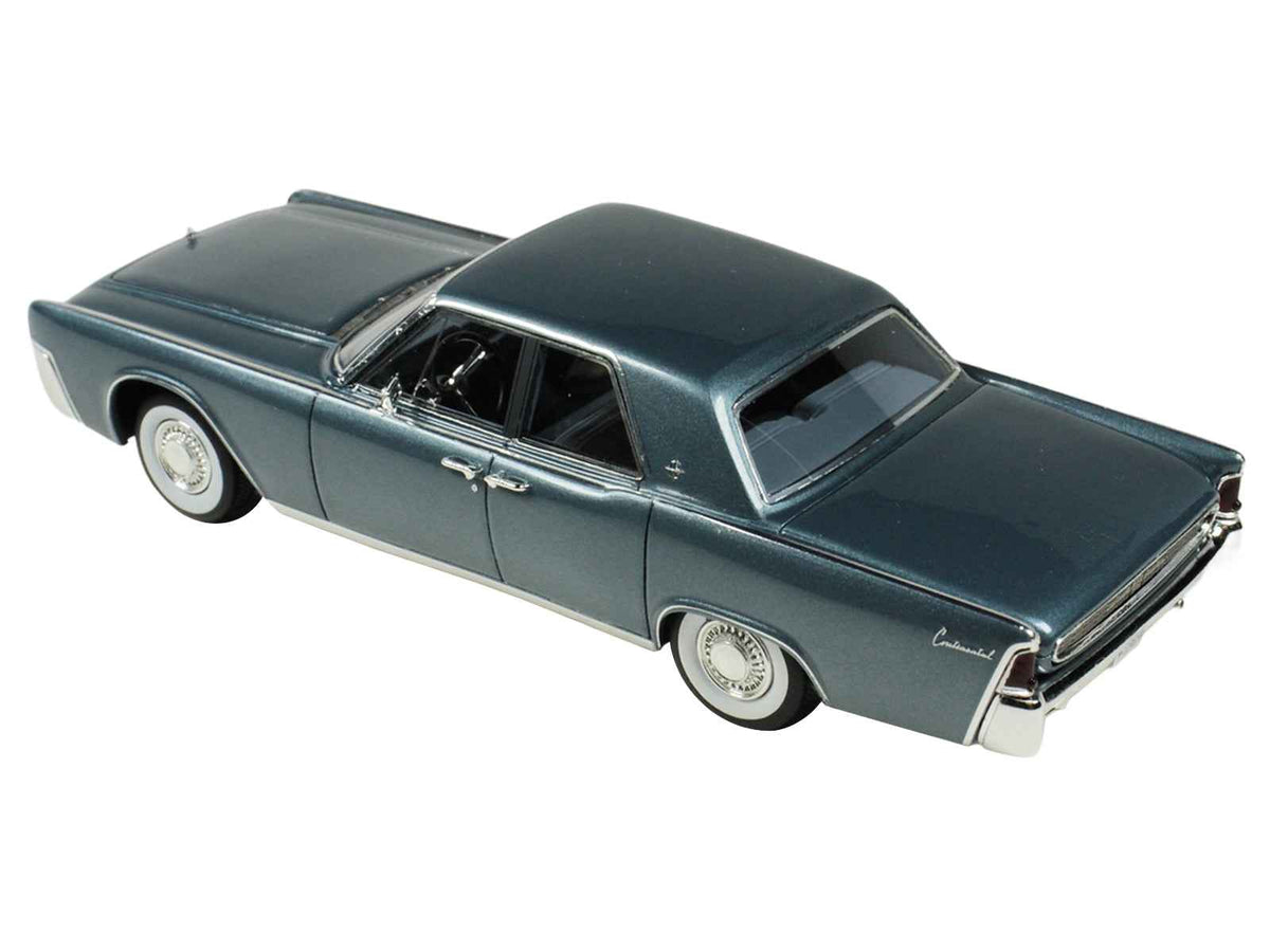 Miniature 1/43 scale Lincoln Continental model car by Goldvarg Collection in Oxford Gray metallic with blue interior, limited edition.