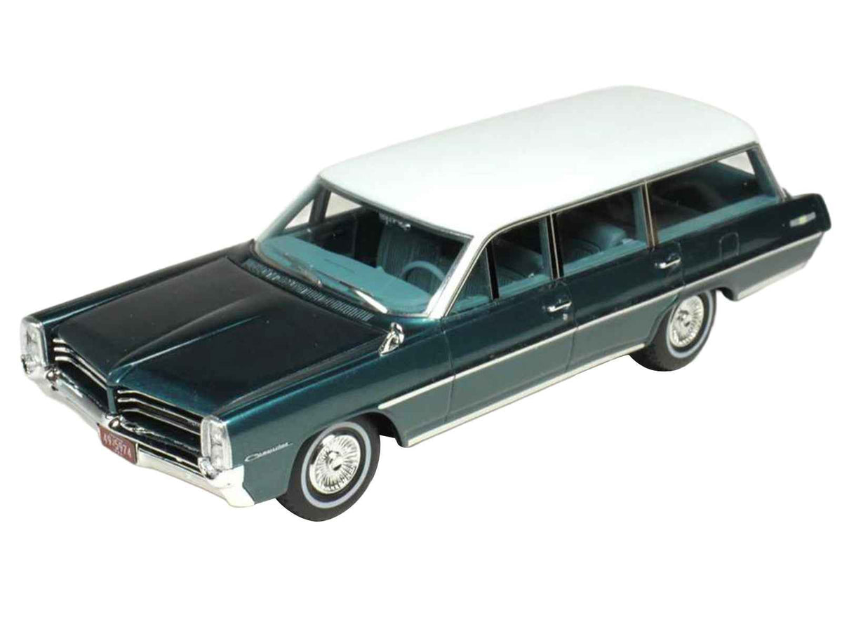 Miniature 1/43 Pontiac Safari Gulfstream model car by Goldvarg Collection featuring aqua metallic finish, white top, and blue interior.