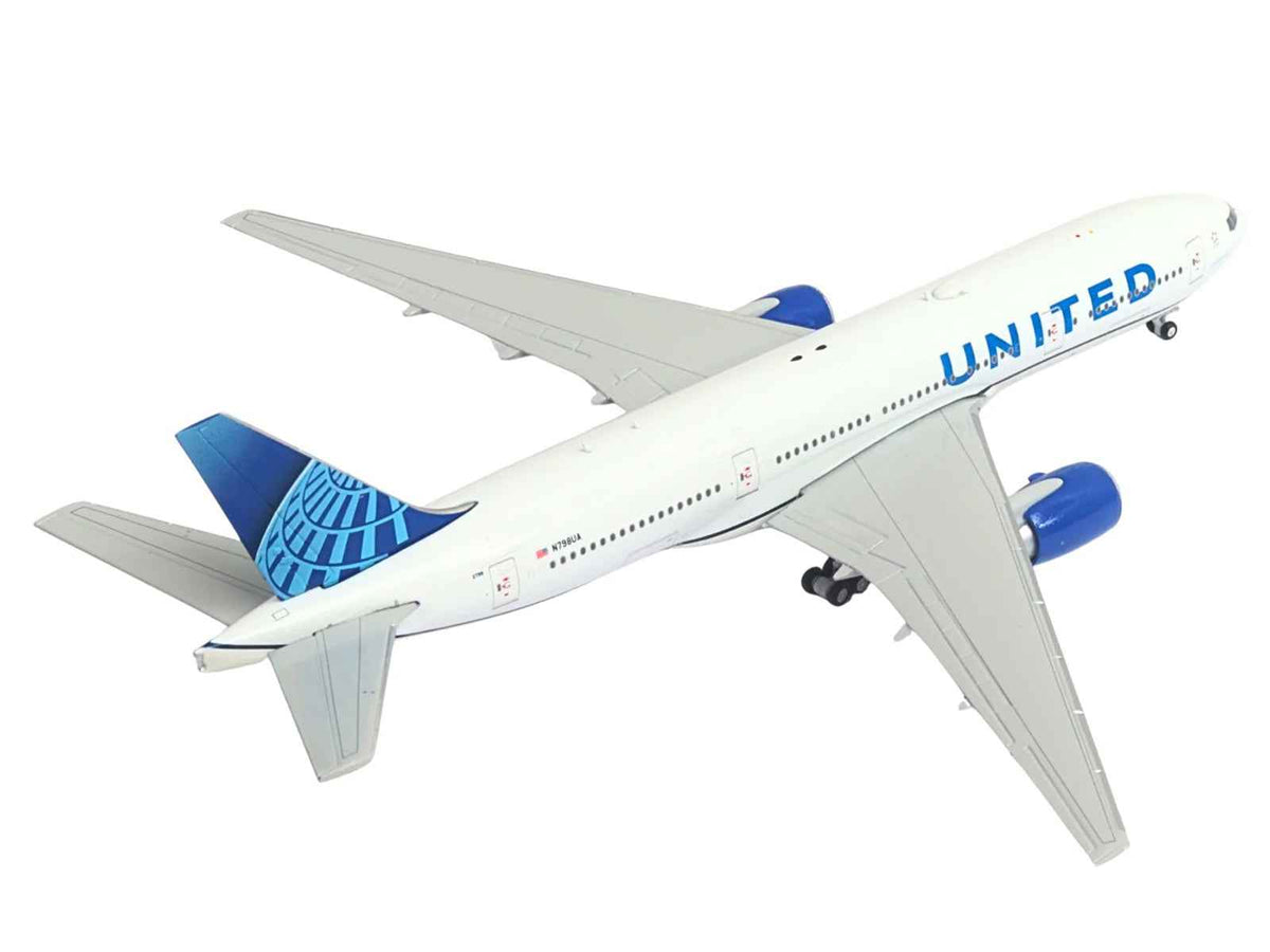 Miniature Motors Boeing 777-200ER United Airlines diecast model airplane in white with blue tail, 1/400 scale by GeminiJets.