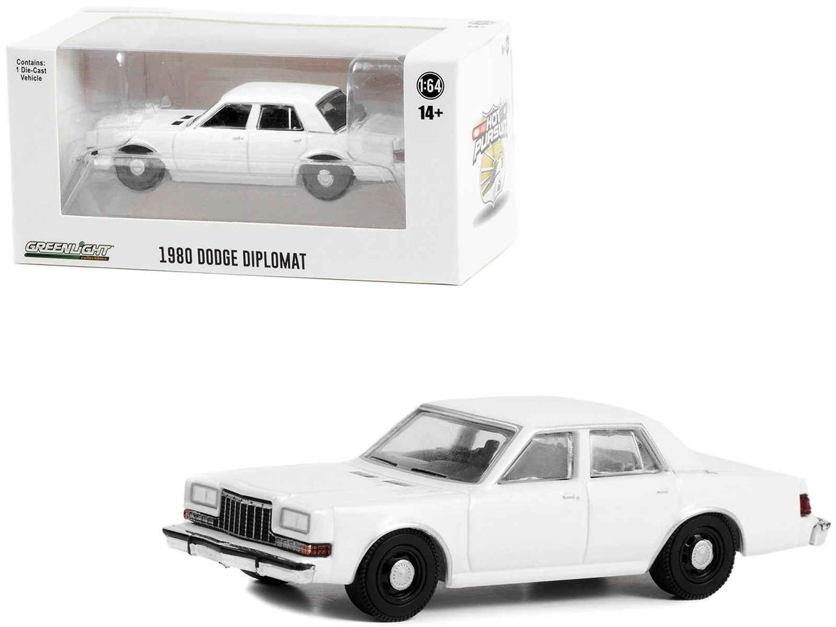 White Dodge Diplomat police car diecast model by Greenlight, unmarked "Hot Pursuit" series, 1/64 scale, Hobby Exclusive.