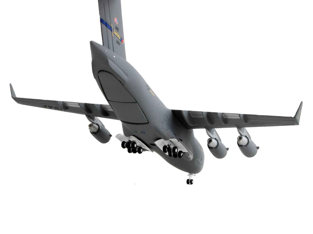 Gray Boeing C-17 Globemaster III model airplane by GeminiJets, detailed 1/400 diecast aircraft of Charlotte Air National Guard.
