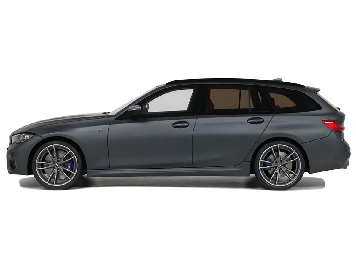 2019 BMW M340i xDrive M gray metallic 1/18 scale model car by GT Spirit, detailed miniature vehicle with realistic features.