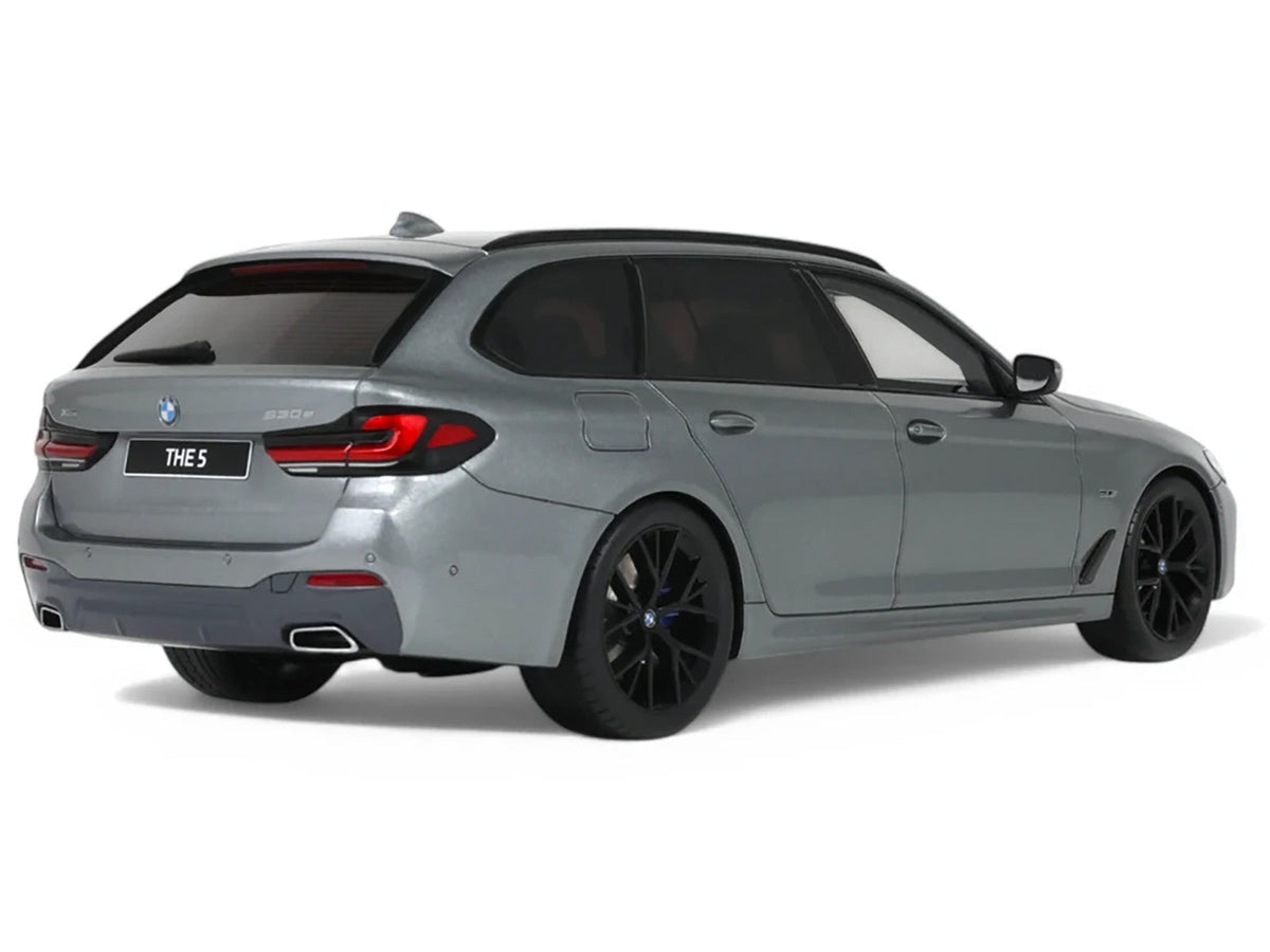 2023 BMW 530E XDrive M silver metallic model car by GT Spirit, detailed miniature BMW 1/18 scale vehicle.
