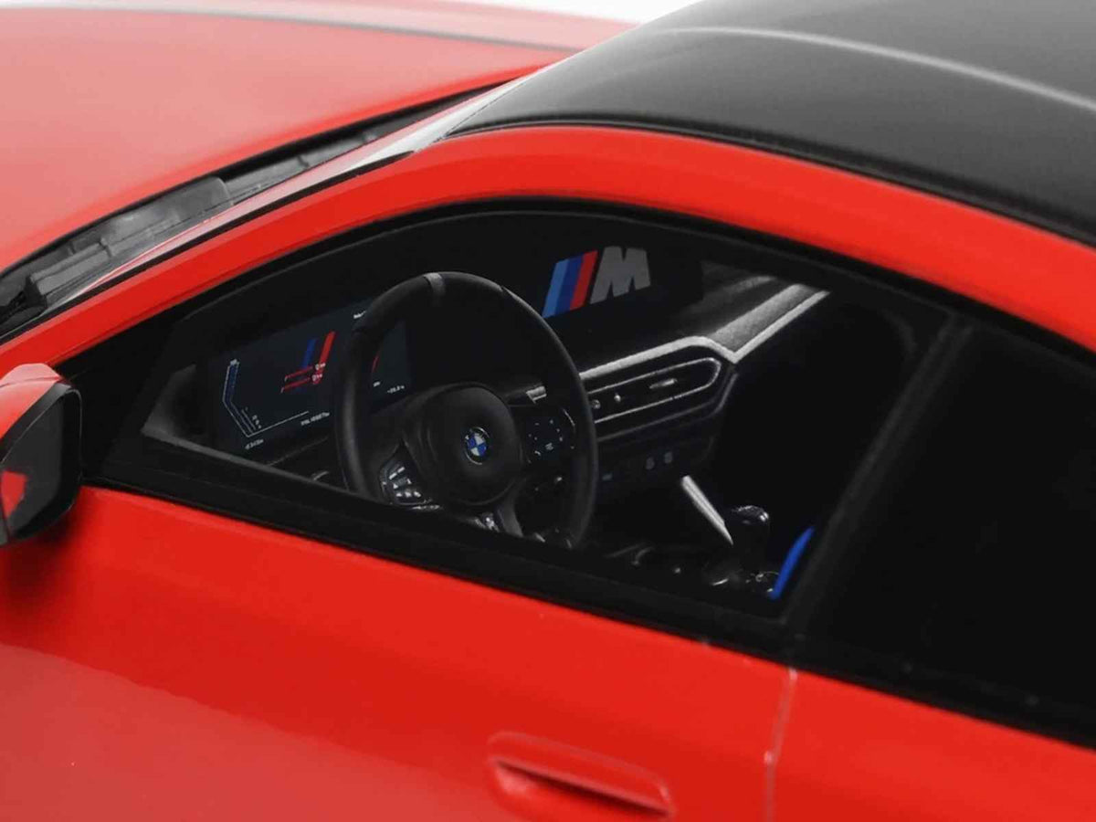 2023 AC Schnitzer ACS2 Sport BMW M2 miniature model car in Toronto Red with black top by GT Spirit, 1/18 scale.