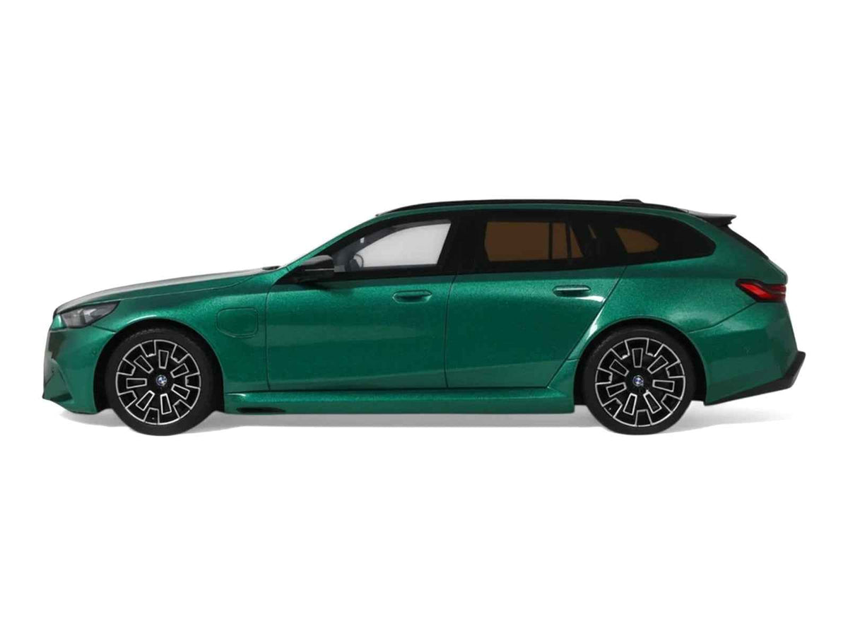 Miniature 1/18 BMW M5 Touring G99 model car in Isle of Man Green Metallic with black roof by GT Spirit, detailed BMW models.