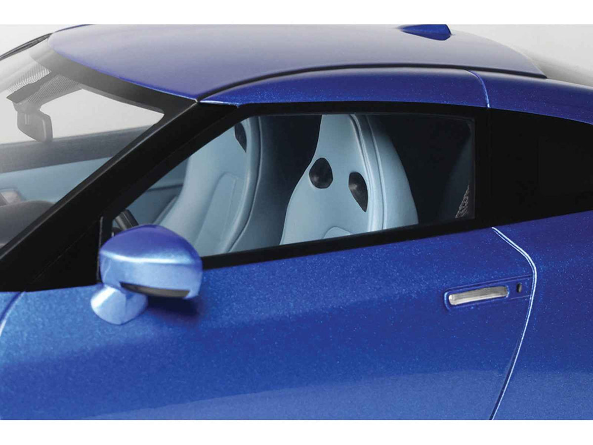 Miniature Nissan GT-R Skyline Edition 1/18 model car in Bayside Blue metallic by GT Spirit, detailed view of the scale model.