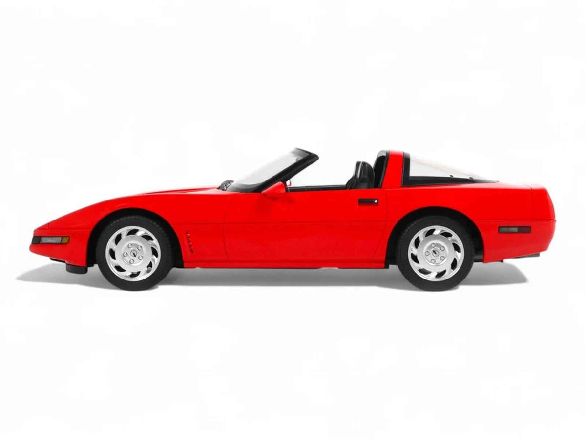 Miniature 1/18 scale Chevrolet Corvette C4 Convertible model car in Torch Red by GT Spirit, detailed collectible toy.