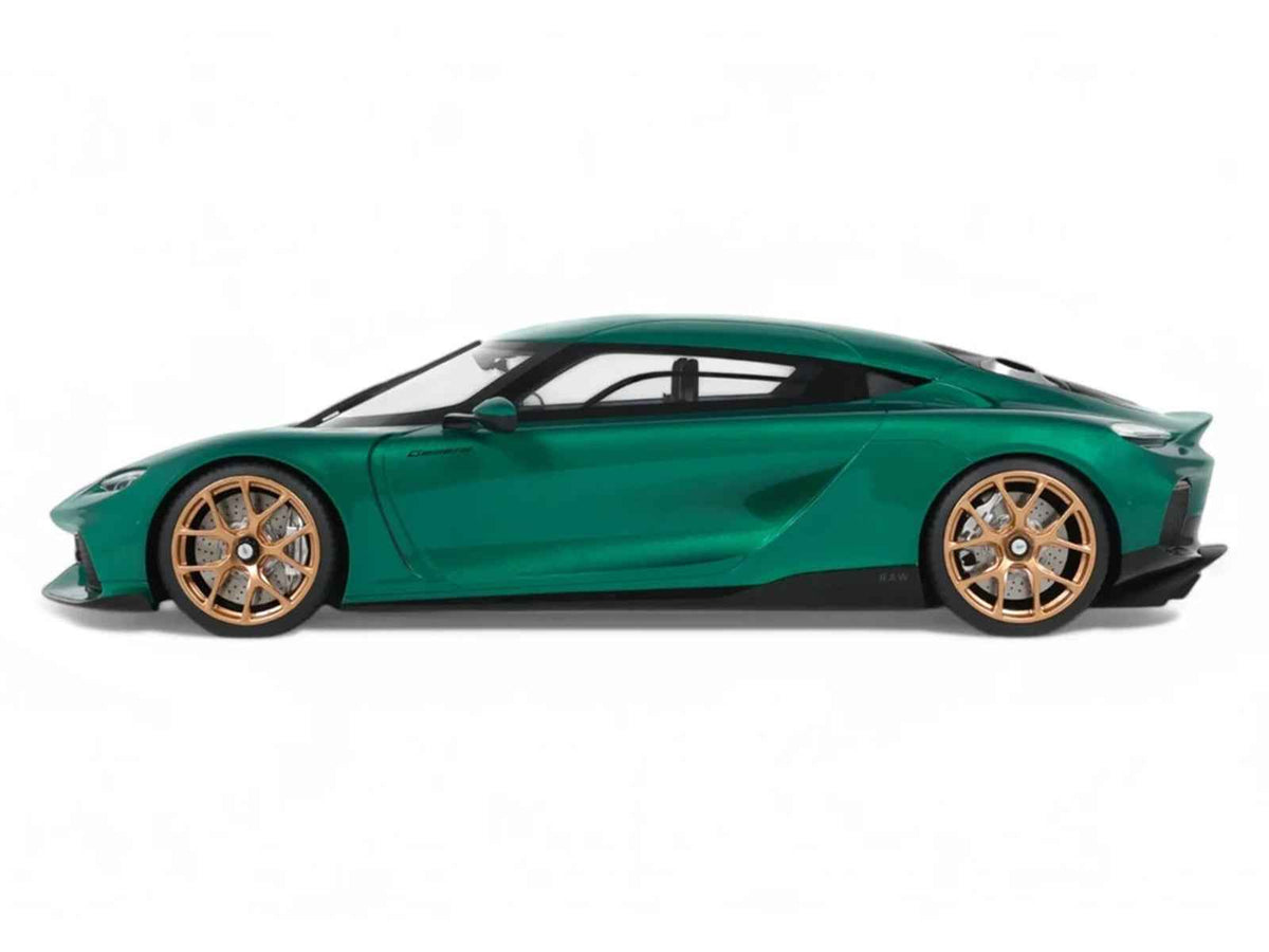 Miniature Motors 1/18 Koenigsegg Gemera model car in racing green metallic by GT Spirit, detailed sports car replica.