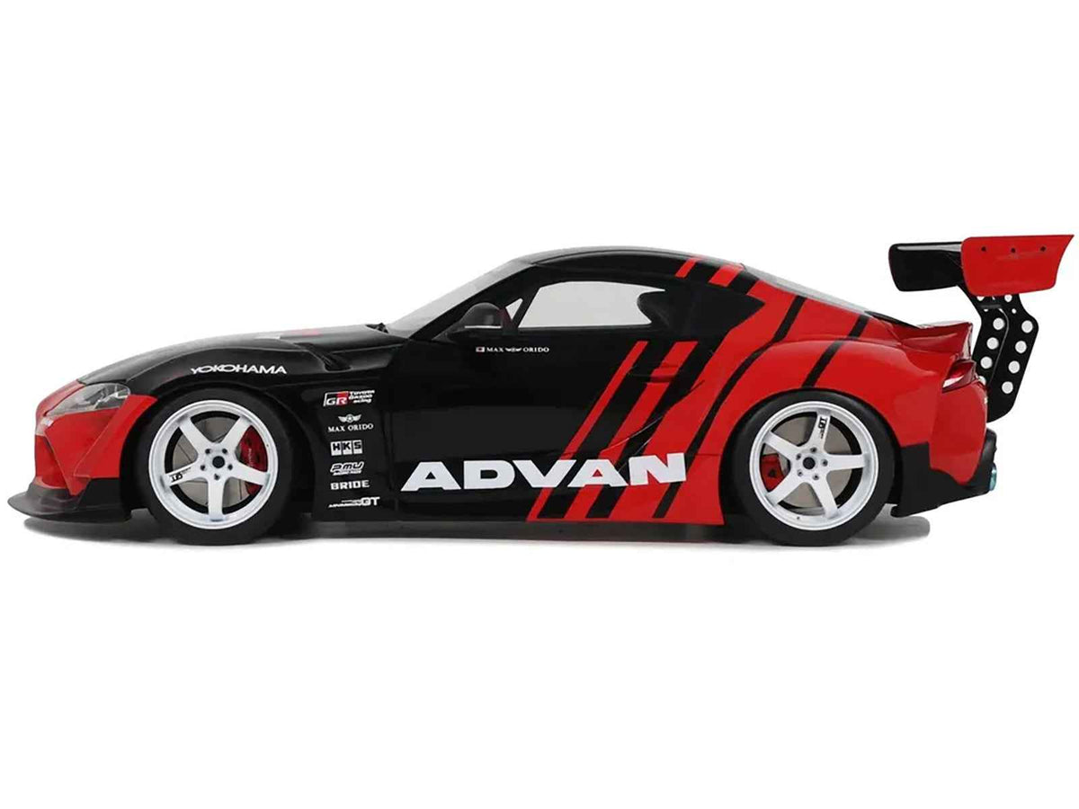 Black and red 1/18 scale Toyota Supra GR RHD model car by GT Spirit, detailed miniature from Miniature Motors.