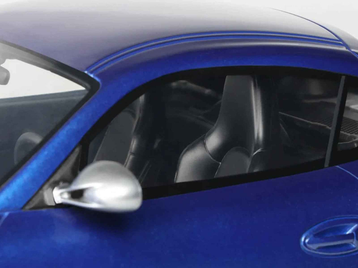 Miniature 2012 Porsche Cayman R Aqua Blue Metallic 1/18 scale model car by GT Spirit, detailed and realistic collectible Porsche model