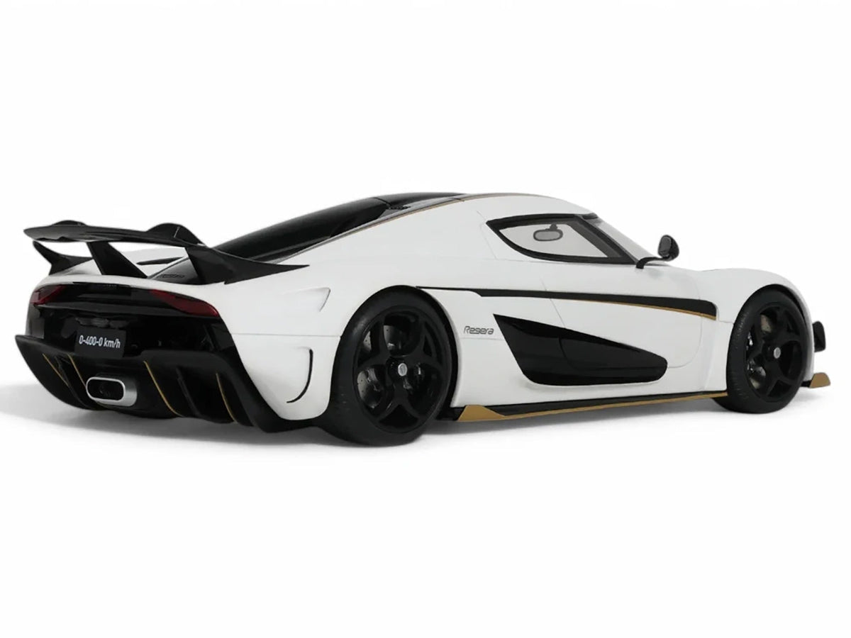 Miniature 1/18 Koenigsegg Regera model car in white with black stripes by GT Spirit, detailed replica from Miniature Motors.