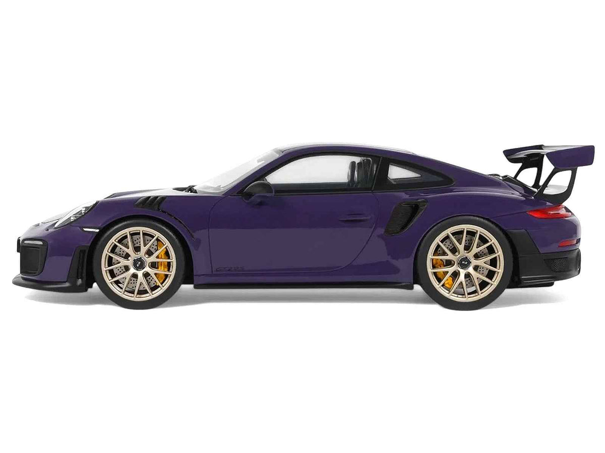 Miniature Porsche 911 (991.2) GT2 RS model car in Ultraviolet Metallic with carbon stripe details by GT Spirit.