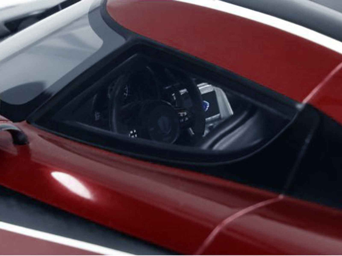 2017 Koenigsegg Agera RS model car in deep red metallic with black stripes by GT Spirit, detailed 1/18 scale miniature.